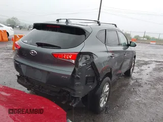 2018 Hyundai Tucson SEL with VIN KM8J3CA4XJU640429, listed as a IAAI auction lot 42063900 with 124,844 mi miles. Bid and sale history available at carsss.com. Image 4.