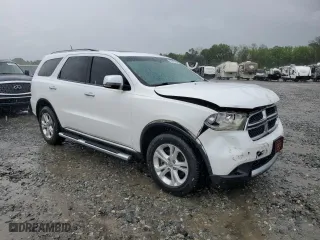 2013 Dodge Durango Crew with VIN 1C4RDHDG4DC535385, listed as a Copart auction lot 50942175 with 211,719 mi miles and Salvage Title. Bid and sale history available at carsss.com. Image 4.