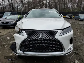 2022 Lexus RX with VIN JTJHZKFA5N2039857, listed as a Copart auction lot 42733963 with 7,011 mi miles. Bid and sale history available at carsss.com. Image 5.