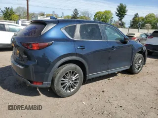 2017 Mazda CX-5 Touring with VIN JM3KFBCL4H0214579, listed as a Copart auction lot 54256775 with 95,541 mi miles and Clean Title. Bid and sale history available at carsss.com. Image 3.
