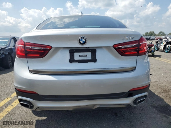 2019 BMW X6 sDrive35i with VIN 5UXKU0C57K0S97385, listed as a Copart auction lot 69103994 with 44,186 mi miles and Salvage Title. Bid and sale history available at carsss.com. Image 6.