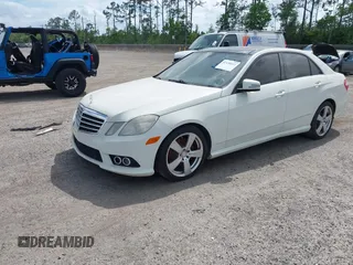 2010 Mercedes-Benz E-Class E 350 Luxury with VIN WDDHF5GB0AA059847, listed as a IAAI auction lot 42158332 with 293,386 mi miles. Bid and sale history available at carsss.com. Image 2.