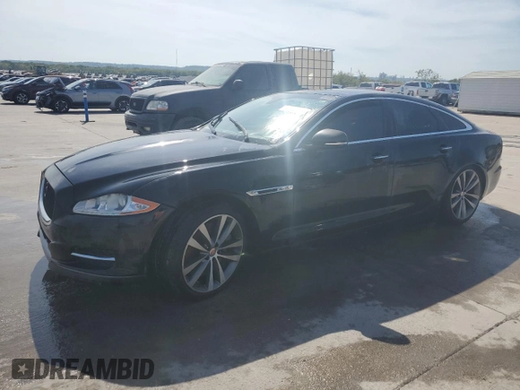 2015 Jaguar XJ with VIN SAJWA3HT8FMV90846, listed as a Copart auction lot 67423804 with 144,516 mi miles and Clean Title. Bid and sale history available at DreamBid. Image 1.