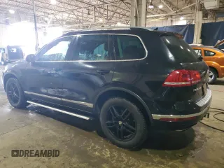 2016 Volkswagen Touareg Sport z VIN WVGEF9BP5GD011285, wystawiony jako Copart lot #47301835 z przebiegiem 179 652 mil mil oraz Czysty tytuł • Clean title. Historia ofert i sprzedaży dostępna na DreamBid. Obrazek 2.
