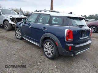 2019 MINI Countryman Cooper S z VIN WMZYT5C54K3G92704, wystawiony jako IAAI lot #41821521 z przebiegiem 95 087 mil mil oraz . Historia ofert i sprzedaży dostępna na DreamBid. Obrazek 3.