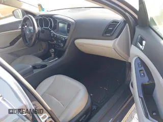 2015 Kia Optima EX with VIN 5XXGN4A77FG368704, listed as a IAAI auction lot 42174674 with 128,963 mi miles. Bid and sale history available at carsss.com. Image 5.