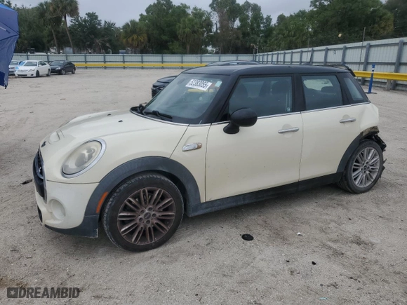 2015 MINI Cooper Hardtop 4 Door S with VIN WMWXU3C59F2B56806, listed as a Copart auction lot 52383055 with 147,817 mi miles and Salvage Title. Bid and sale history available at carsss.com. Image 1.