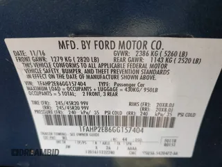 2016 Ford Taurus SEL with VIN 1FAHP2E86GG157404, listed as a IAAI auction lot 41880629 with 149,161 mi miles and . Bid and sale history available at DreamBid. Image 9.