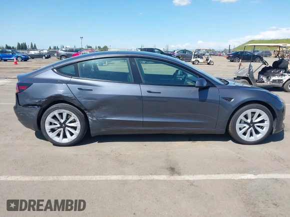 2022 Tesla Model 3 with VIN 5YJ3E1EA6NF144098, listed as a IAAI auction lot 41965360 with 75,597 mi miles. Bid and sale history available at carsss.com. Image 13.