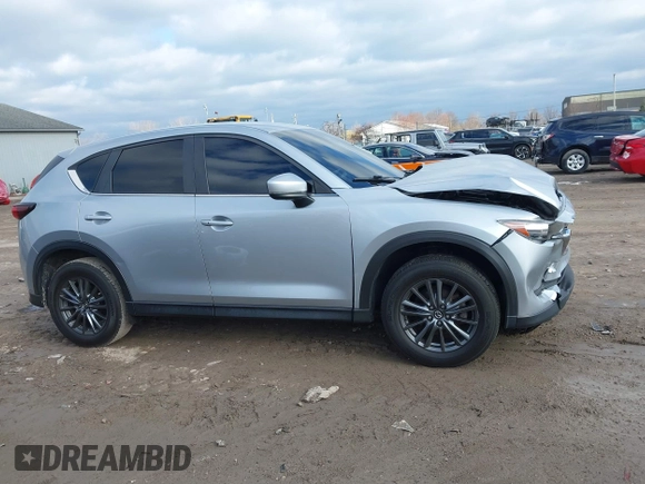 2020 Mazda CX-5 Touring with VIN JM3KFACM5L0768371, listed as a IAAI auction lot 41862623 with 138,446 mi miles and . Bid and sale history available at carsss.com. Image 13.