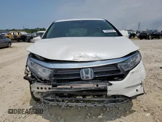 2023 Honda Odyssey Touring с VIN 5FNRL6H8XPB001311, выставлен на аукционе Copart как лот 56924345 с пробегом 77 736 миль миль и Списание • Salvage title. История ставок и продаж доступна на DreamBid. Изображение 5.