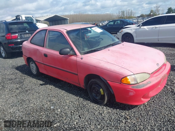1995 Hyundai Accent z VIN KMHVD14N9SU047038, wystawiony jako IAAI lot #41895712 z przebiegiem 186 094 mil mil oraz . Historia ofert i sprzedaży dostępna na DreamBid. Obrazek 1.