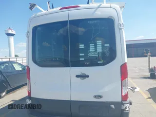 2015 Ford Transit Cargo z VIN 1FTNR2CG1FKB04641, wystawiony jako IAAI lot #42642710 z przebiegiem 136 892 mil mil oraz . Historia ofert i sprzedaży dostępna na DreamBid. Obrazek 16.