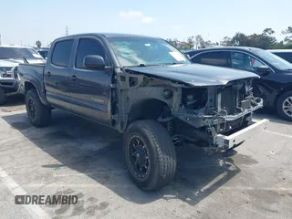 2010 Toyota Tacoma PreRunner z VIN 3TMJU4GN9AM097599, wystawiony jako IAAI lot #42153344 z przebiegiem 213 063 mil mil oraz . Historia ofert i sprzedaży dostępna na DreamBid. Obrazek 1.