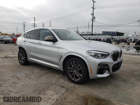 2020 BMW X4 M40i z VIN 5UX2V5C02L9B14571, wystawiony jako Copart lot #44318703 z przebiegiem 14 861 mil mil oraz . Historia ofert i sprzedaży dostępna na DreamBid. Obrazek 4.