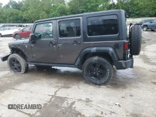 2016 Jeep Wrangler Unlimited Sport with VIN 1C4BJWDG1GL165418, listed as a Copart auction lot 61364095 with 123,772 mi miles and Salvage title. Bid and sale history available at DreamBid. Image 2.