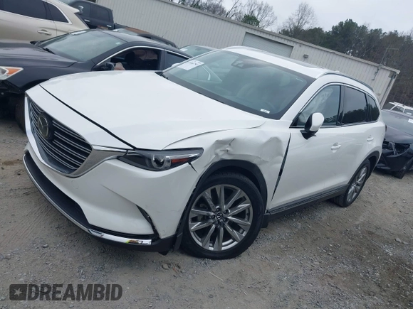 2016 Mazda CX-9 Grand Touring with VIN JM3TCADY0G0113779, listed as a IAAI auction lot 41466750 with 58,035 mi miles and . Bid and sale history available at DreamBid. Image 14.