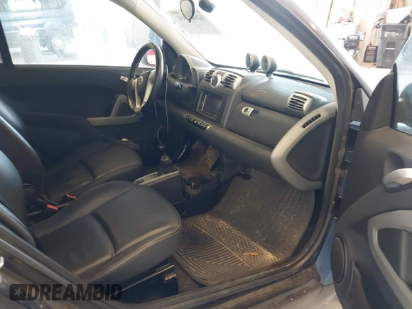 2009 Smart fortwo Pure with VIN WMEEJ31X89K228315, listed as a IAAI auction lot 42662931 with 60,666 mi miles and . Bid and sale history available at DreamBid. Image 5.