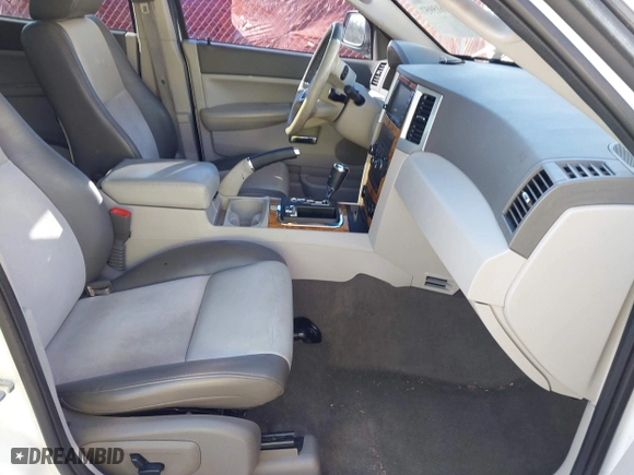 2009 Jeep Grand Cherokee Limited with VIN 1J8HR58P89C513900, listed as a IAAI auction lot 41615957 with 152,119 mi miles. Bid and sale history available at carsss.com. Image 5.