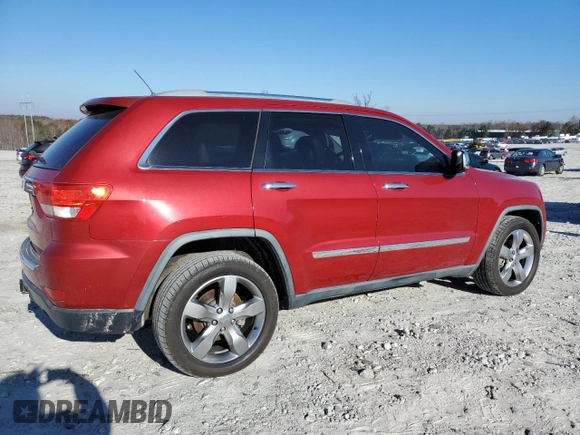 2011 Jeep Grand Cherokee Overland with VIN 1J4RS6GG7BC665979, listed as a Copart auction lot 83394214 with 216,988 mi miles and Salvage Title. Bid and sale history available at DreamBid. Image 3.