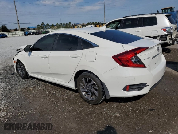 2018 Honda Civic EX с VIN 19XFC2F7XJE034358, выставлен на аукционе Copart как лот 43976415 с пробегом 117 514 миль миль и Списание • Salvage title. История ставок и продаж доступна на DreamBid. Изображение 2.