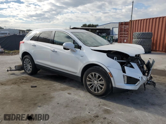 2018 Cadillac XT5 Luxury FWD with VIN 1GYKNCRS8JZ182473, listed as a Copart auction lot 50053345 with 76,595 mi miles and Salvage title. Bid and sale history available at DreamBid. Image 4.