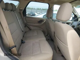 2005 Ford Escape XLT with VIN 1FMYU03165KC03784, listed as a Copart auction lot 64299225 with 185,033 mi miles and Salvage title. Bid and sale history available at DreamBid. Image 11.