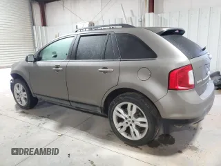 2014 Ford Edge SEL with VIN 2FMDK3JC0EBB38354, listed as a Copart auction lot 43986015 with 104,139 mi miles and Salvage Title. Bid and sale history available at carsss.com. Image 2.