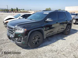 2020 GMC Acadia AT4 with VIN 1GKKNLLS3LZ115642, listed as a Copart auction lot 52048555 with 64,838 mi miles and Salvage title. Bid and sale history available at DreamBid. Image 1.
