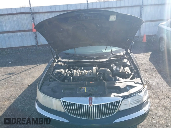 2001 Lincoln Continental with VIN 1LNHM97V41Y716010, listed as a IAAI auction lot 41470767 with 163,092 mi miles and . Bid and sale history available at DreamBid. Image 10.