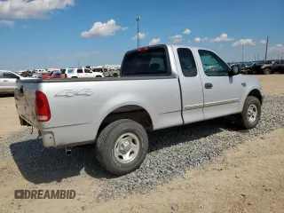 2004 Ford F-150 XL with VIN 2FTRX18WX4CA54373, listed as a Copart auction lot 63733095 with Not provided miles and Salvage title. Bid and sale history available at DreamBid. Image 3.