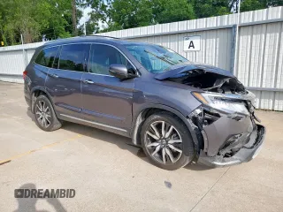 2021 Honda Pilot Elite with VIN 5FNYF6H09MB051707, listed as a Copart auction lot 59348355 with 100,000 mi miles and Salvage title. Bid and sale history available at DreamBid. Image 4.
