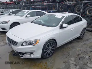 2017 Volvo S60 Inscription with VIN LYV402HKXHB148240, listed as a IAAI auction lot 41618292 with 77,870 mi miles. Bid and sale history available at carsss.com. Image 2.