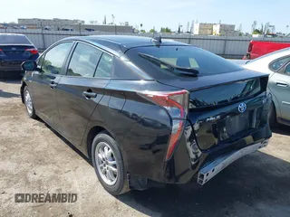2016 Toyota Prius Two with VIN JTDKBRFU9G3021083, listed as a IAAI auction lot 41986733 with 117,227 mi miles and . Bid and sale history available at DreamBid. Image 3.