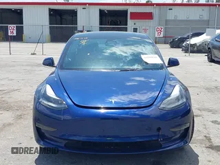2023 Tesla Model 3 with VIN 5YJ3E1EA0PF658080, listed as a IAAI auction lot 42008846 with 32,301 mi miles and . Bid and sale history available at carsss.com. Image 13.