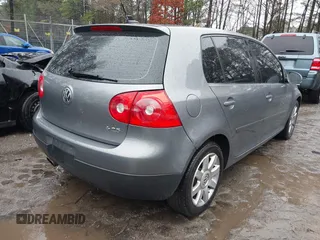 2009 Volkswagen Rabbit S with VIN WVWDB71K69W142447, listed as a IAAI auction lot 41548670 with 175,428 mi miles. Bid and sale history available at carsss.com. Image 4.