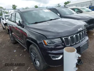 2019 Jeep Grand Cherokee Limited with VIN 1C4RJFBG1KC772977, listed as a IAAI auction lot 42242969 with 96,902 mi miles and . Bid and sale history available at DreamBid. Image 1.