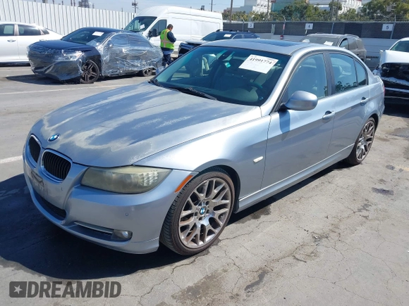 2009 BMW 3 Series 328i with VIN WBAPH77509NM27323, listed as a IAAI auction lot 41991774 with 96,217 mi miles. Bid and sale history available at carsss.com. Image 2.