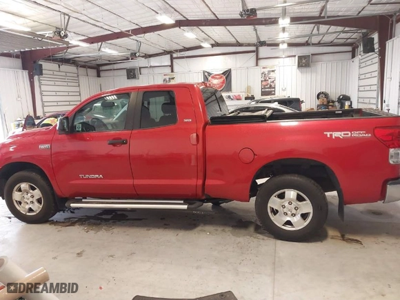 2012 Toyota Tundra 4WD Truck with VIN 5TFUY5F19CX212110, listed as a IAAI auction lot 41394569 with NaN miles. Bid and sale history available at carsss.com. Image 14.