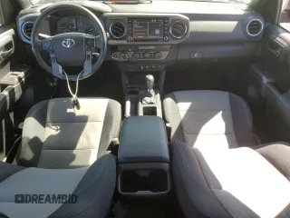 2021 Toyota Tacoma 4WD SR5 with VIN 3TMDZ5BN9MM099787, listed as a Copart auction lot 49717425 with 56,374 mi miles and Salvage Title. Bid and sale history available at carsss.com. Image 8.