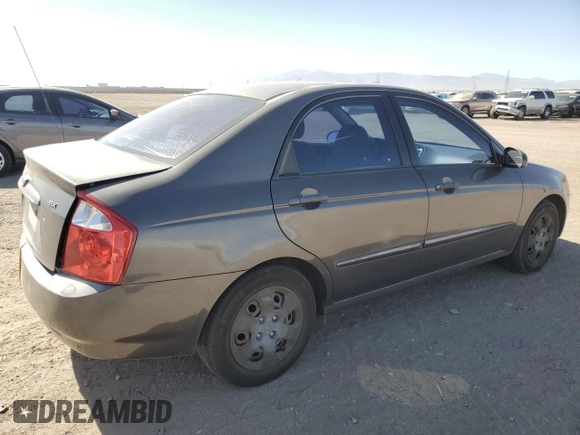 2006 Kia Spectra EX with VIN KNAFE122X65277053, listed as a Copart auction lot 75697314 with 147,156 mi miles and Salvage Title. Bid and sale history available at carsss.com. Image 3.
