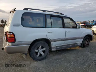 2000 Toyota Land Cruiser z VIN JT3HT05J0Y0122711, wystawiony jako Copart lot #86929954 z przebiegiem Nie podano mil oraz Czysty tytuł • Clean title. Historia ofert i sprzedaży dostępna na DreamBid. Obrazek 3.