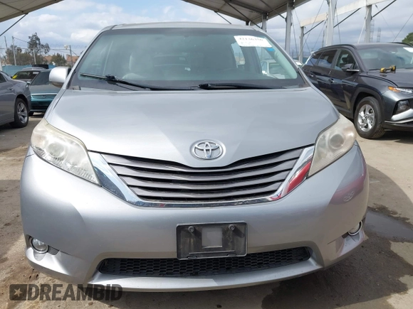 2015 Toyota Sienna XLE with VIN 5TDYK3DC1FS611521, listed as a IAAI auction lot 42136356 with 102,734 mi miles. Bid and sale history available at carsss.com. Image 13.