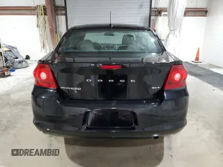2012 Dodge Avenger SXT with VIN 1C3CDZCB2CN219430, listed as a Copart auction lot 53958865 with 99,106 mi miles and Salvage Title. Bid and sale history available at DreamBid. Image 6.