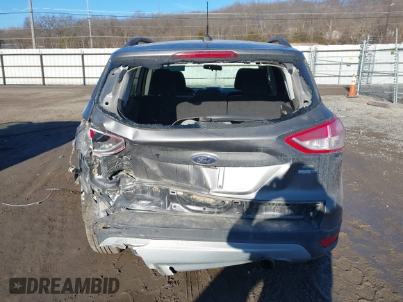 2014 Ford Escape SE z VIN 1FMCU9GXXEUB99093, wystawiony jako IAAI lot #41662040 z przebiegiem 120 783 mil mil oraz . Historia ofert i sprzedaży dostępna na DreamBid. Obrazek 17.