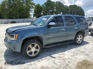 2008 Chevrolet Tahoe LTZ with VIN 1GNFC13J18R118486, listed as a Copart auction lot 61852875 with 262,907 mi miles and Salvage title. Bid and sale history available at DreamBid. Image 1.
