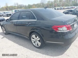 2014 Mercedes-Benz E-Class E 350 Sport with VIN WDDHF5KBXEA884579, listed as a IAAI auction lot 42027214 with 163,488 mi miles. Bid and sale history available at carsss.com. Image 3.