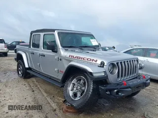 2020 Jeep Gladiator Rubicon with VIN 1C6JJTBG7LL181833, listed as a IAAI auction lot 42493073 with 13,775 mi miles and . Bid and sale history available at DreamBid. Image 1.