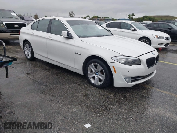 2012 BMW 5 Series 528i with VIN WBAXG5C55CDW85766, listed as a IAAI auction lot 41373727 with 105,056 mi miles. Bid and sale history available at carsss.com. Image 1.