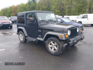 2004 Jeep Wrangler X with VIN 1J4FA39S94P707411, listed as a IAAI auction lot 42187856 with 189,519 mi miles. Bid and sale history available at carsss.com. Image 1.